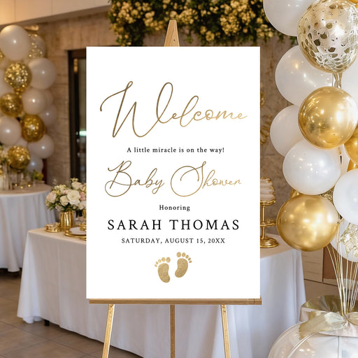 Personalized baby shower welcome sign with A Little Miracle Is on the Way wording, honoree’s name, event date and baby footprints