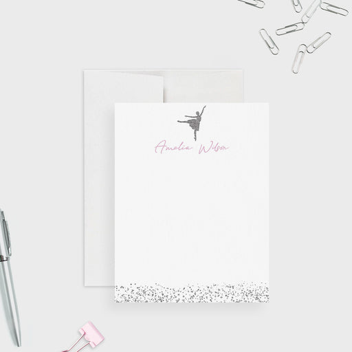 Ballerina note card with a gray dancer silhouette, pink script name and printed gray sparkle along the bottom edge.