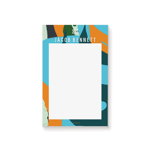 Personalized notepad featuring a Star of David and colorful abstract design, customized with a name, ideal for a Bar Mitzvah gift.