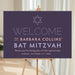 Personalized Bat Mitzvah welcome sign in plum purple with Star of David, celebrant name, and event date