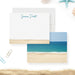 Personalized white note card with a sandy lower border and an ocean, blue sky and beach photo on the reverse.