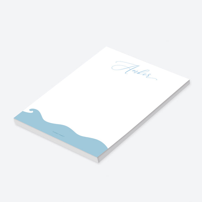 Personalized notepad with hand-drawn blue ocean waves at the bottom, custom stationery for beach weddings-side