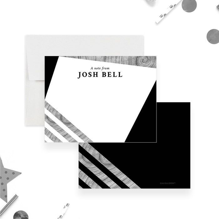 Personalized Black and Gray Business Note Cards. Front and black back with diagonal printed silver stripes shown with a white envelope.