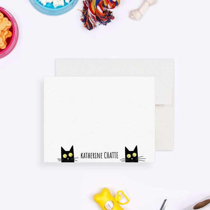 Personalized note card with two black cat faces and a personalized name, shown with a white envelope.