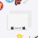 Personalized note card with two black cat faces and a personalized name, shown with a white envelope.