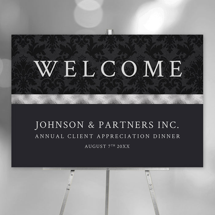 Personalized black corporate client appreciation dinner welcome sign with damask pattern, Johnson and Partners company name and annual event date