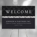 Personalized black corporate client appreciation dinner welcome sign with damask pattern, Johnson and Partners company name and annual event date