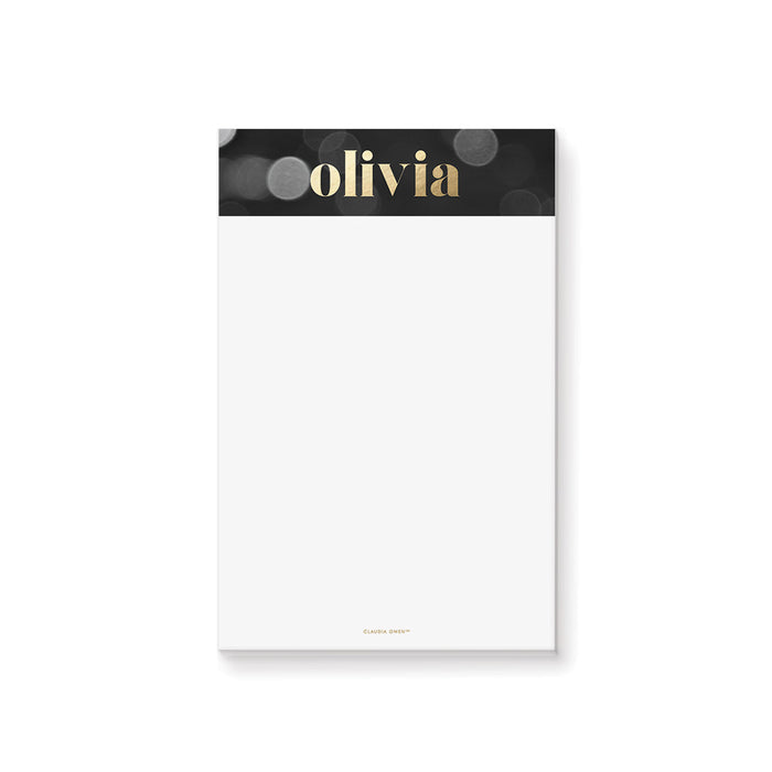 Personalized black and gold bokeh notepad for women with custom name and spacious white writing area
