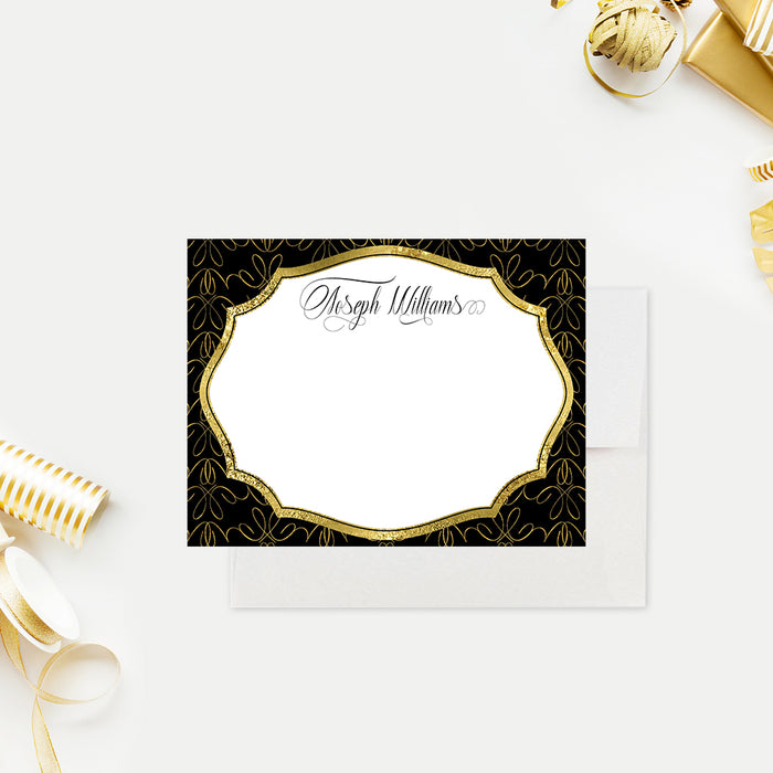 Personalized black and gold note card shown with a script name, ornate gold frame, looping patterned border, and blank white writing area-front