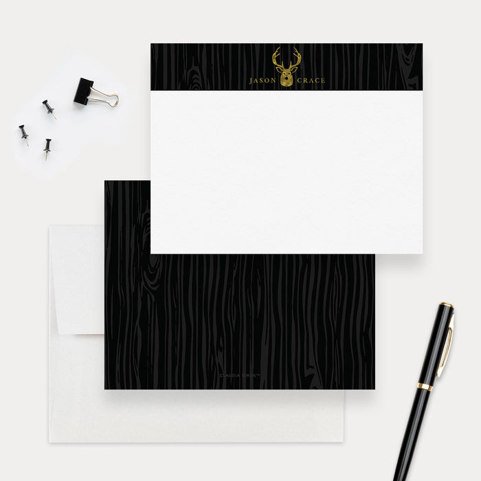 Personalized deer note cards with a gold deer illustration on a black wood grain band and a matching black wood grain reverse.