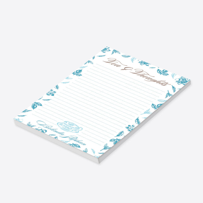Personalized blue floral Tea and Thoughts notepad with botanical border, teacup illustration, lined writing space, and custom name-side
