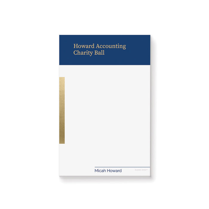 Personalized charity ball notepad with navy blue header, gold accent, event name, and custom name at the bottom.