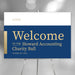 Blue and gold charity ball welcome sign on an easel with a logo area and personalized event details