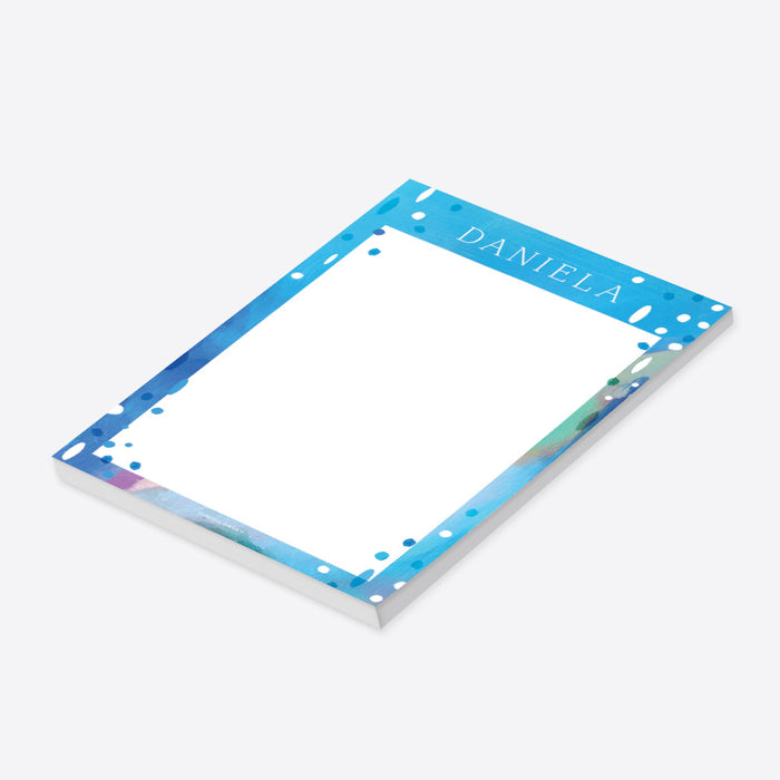 personalized blue painted notepad with custom name, cool abstract blue border, white writing space, and summer-inspired design-side