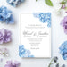 Personalized blue floral wedding invitation with watercolor flowers, elegant script names, and custom wedding details-front