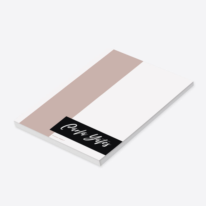 Personalized blush pink and black notepad with a custom name in white script lettering, and a white writing area.