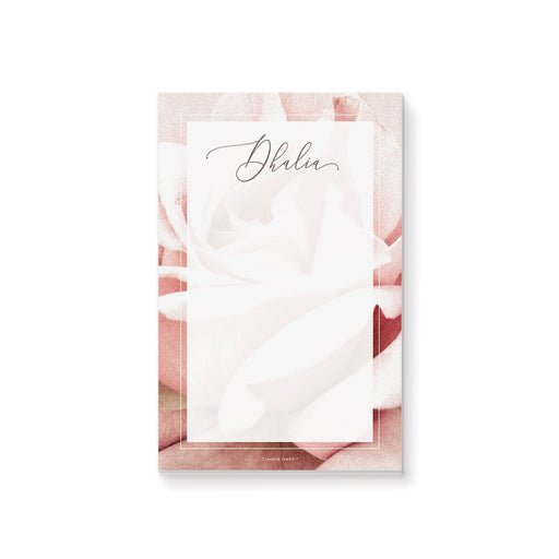 personalized blush rose floral notepad with custom name, soft pink rose background, and blank writing space