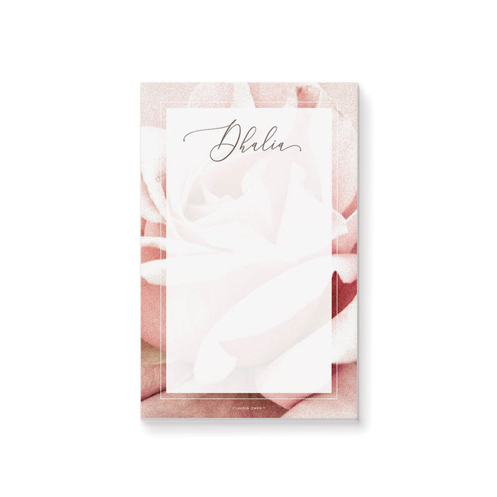 personalized blush rose floral notepad with custom name, soft pink rose background, and blank writing space
