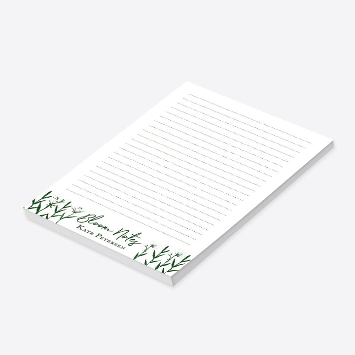 Personalized botanical notepad with a clean white writing area, green wildflowers, Bloom Notes wording, and custom name-side
