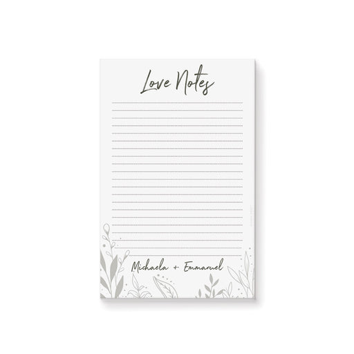 personalized botanical wedding notepad with Love Notes heading, couple names, lined writing pages, and delicate foliage illustration