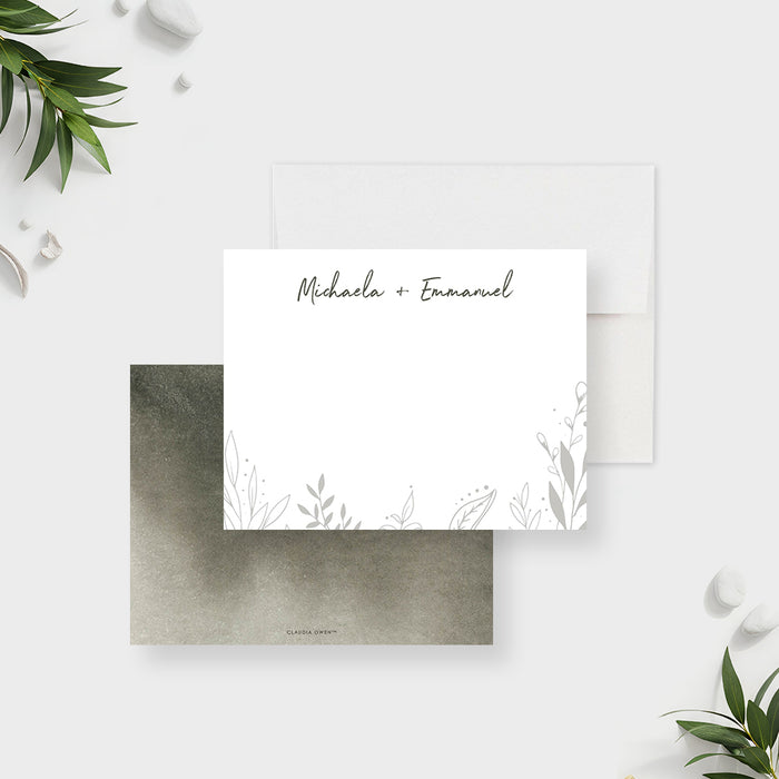 personalized botanical wedding thank you card with couple names, delicate foliage line art, white front, and moody green back design-front-back