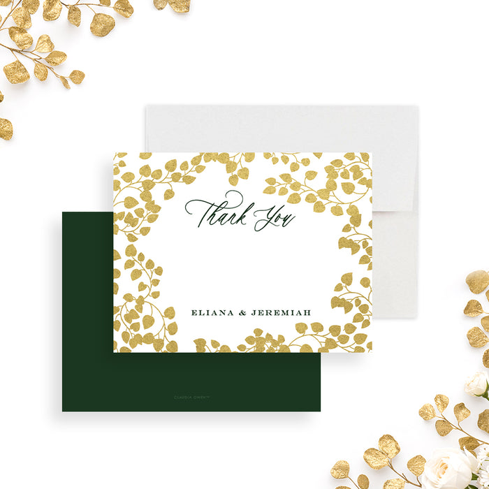 Personalized green and gold botanical wedding thank you card with gold leafy border, “Thank You” script, and couple’s names-front-back