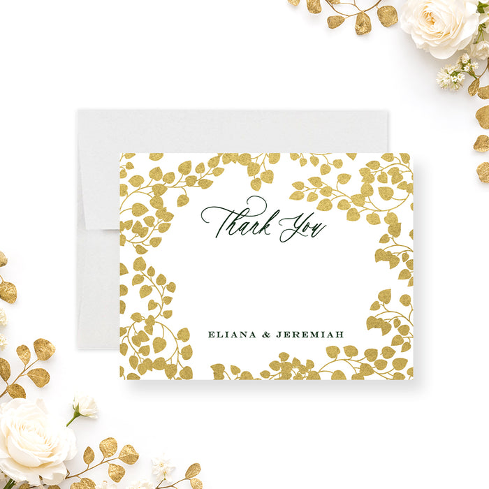Personalized green and gold botanical wedding thank you card with gold leafy border, “Thank You” script, and couple’s names-front