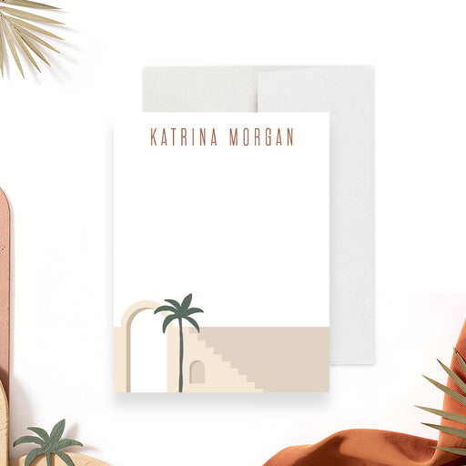 Front and back of a personalized boho note card with custom name, desert arches, green palm tree, terracotta and neutral accents-front