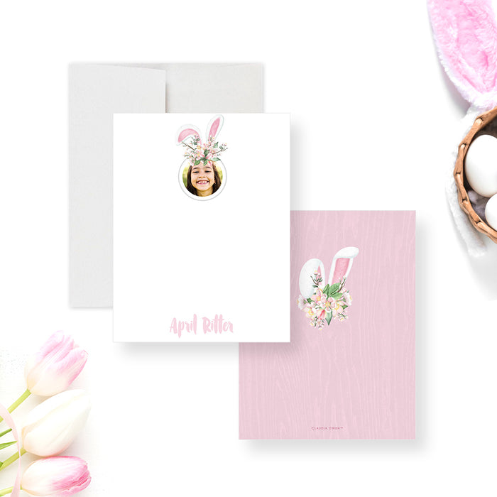 Personalized Bunny Photo Note Cards. Front and pink patterned back with floral bunny ears shown with a white envelope.
