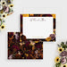 Front and back of personalized note cards with a dark burgundy floral frame, thank you wording and personalized names and a coordinating dark floral back.