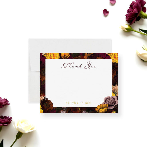Personalized note card with a dark burgundy floral frame, thank you wording and personalized names, shown with a white envelope.