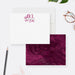 Front and back of personalized note cards with a burgundy script initial and personalized name and a burgundy marble patterned back.
