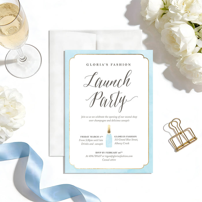 Personalized business launch party invitation with company name, large Launch Party script, pale blue champagne bottle, blue border and custom event details-front