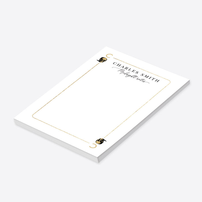 Personalized white casino notepad styled as a playing card with custom name, Midnight Notes wording, gold border and skull illustrations-side