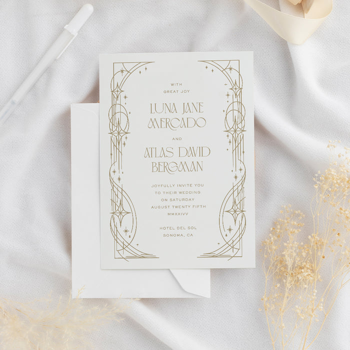 Personalized celestial Art Deco wedding invitation with custom couple’s names, ceremony details, star motifs and geometric gold border-front