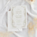 Personalized celestial Art Deco wedding invitation with custom couple’s names, ceremony details, star motifs and geometric gold border-front