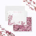 Personalized Cherry Blossom Note Cards. Front and matching pink cherry blossom floral back displayed with a white envelope.