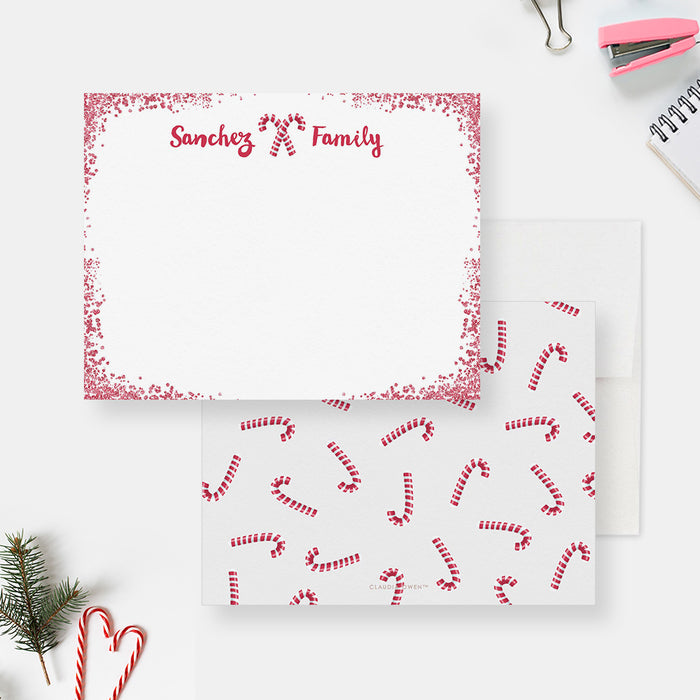 White personalized Christmas note card with a red dotted border and candy canes, beside a red candy cane-patterned back.