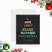 personalized Christmas greeting card with Joy Love Peace Rejoice wording, festive tree artwork, dark background, and custom family name-front