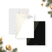 Personalized Christmas note cards with a printed gold pine pattern on the white writing front and a matching pattern on the black reverse.