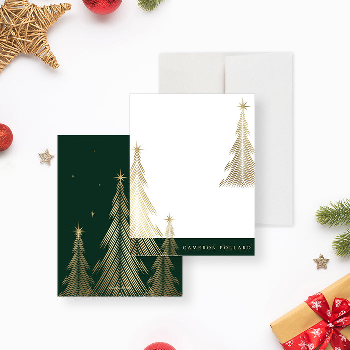 Personalized Christmas note cards with printed gold tree illustrations on the white writing front and a dark green tree patterned reverse.
