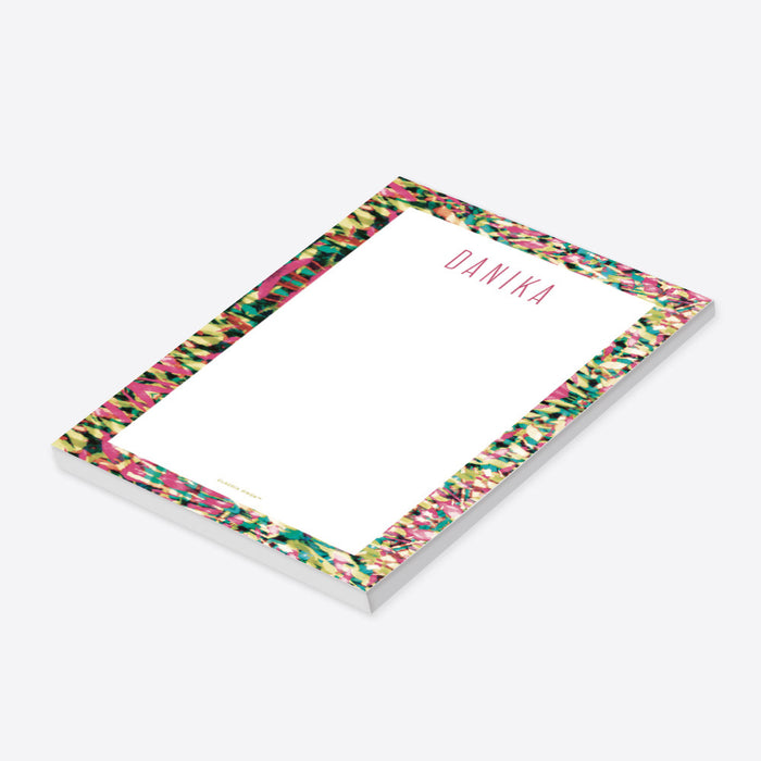 personalized notepad with colorful abstract border, custom name, and clean white writing space-side