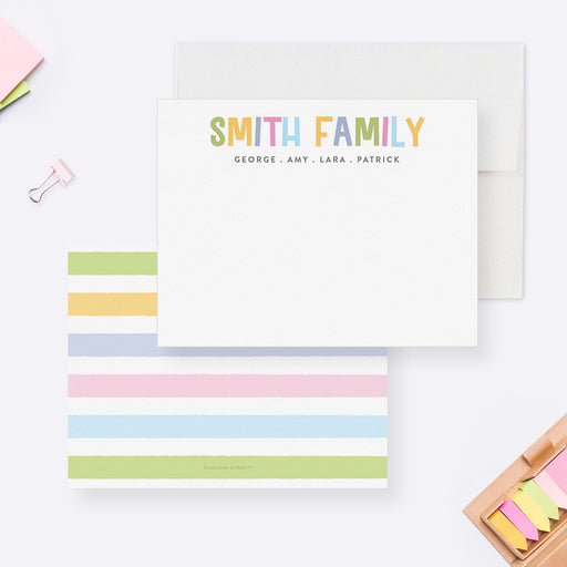 Family note cards with multicolor family name lettering on white and a pastel striped reverse.