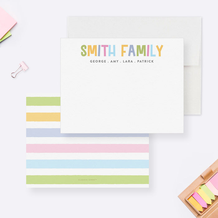 Family note cards with multicolor family name lettering on white and a pastel striped reverse.