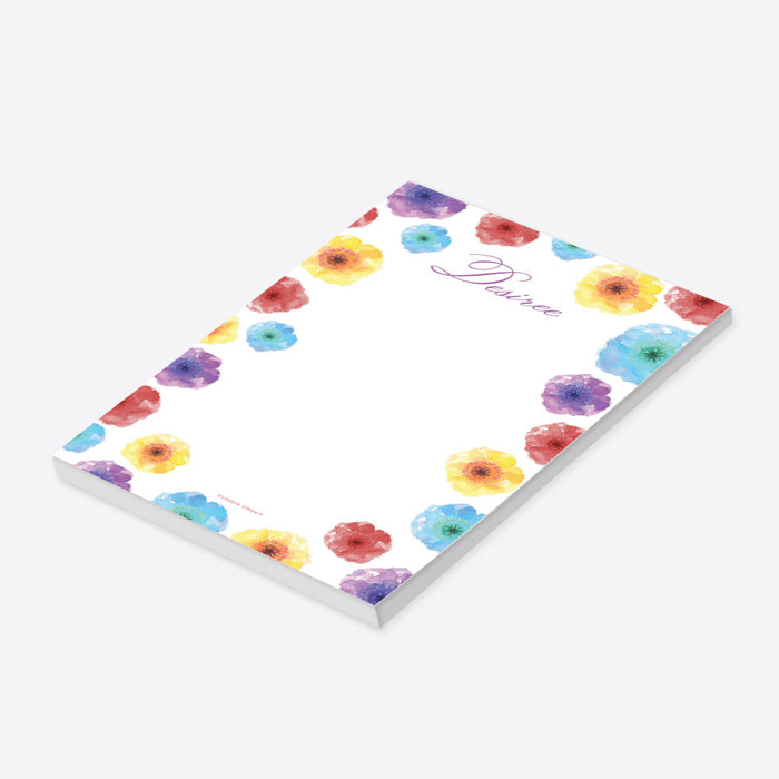 personalized colorful floral notepad with watercolor flower border, custom name in script lettering, and blank writing space-side