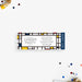 Personalized geometric birthday dinner party ticket invitation with navy, red and yellow color blocks, honoree’s name, event details and Admit One wording