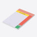 Personalized geometric notepad with a name, soft lavender writing area, and coral, yellow, blush, gray, and green color blocks-side