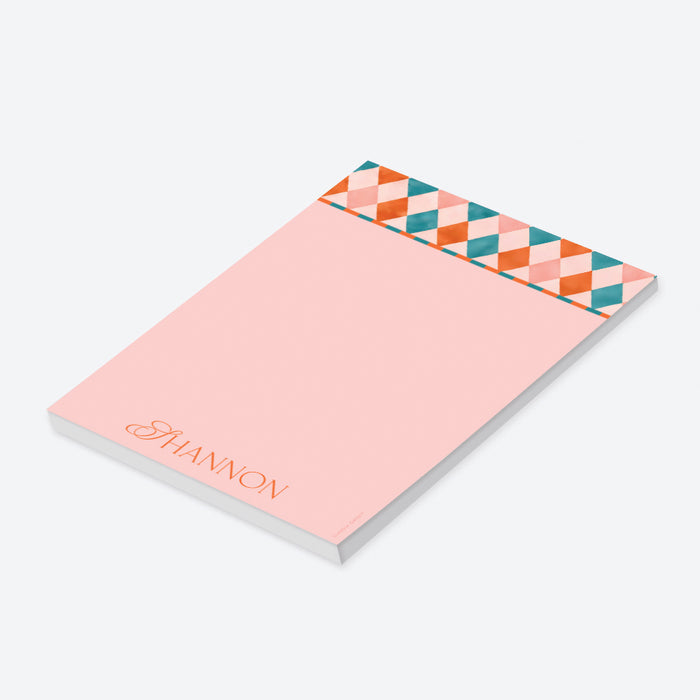 Personalized colorful geometric notepad with custom name, blush pink, teal, coral, orange pattern, and blank writing area-side