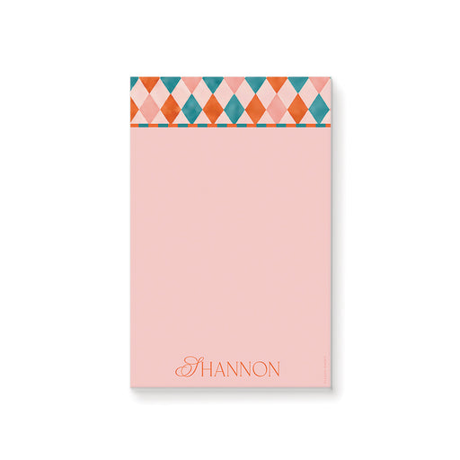 Personalized colorful geometric notepad with custom name, blush pink, teal, coral, orange pattern, and blank writing area