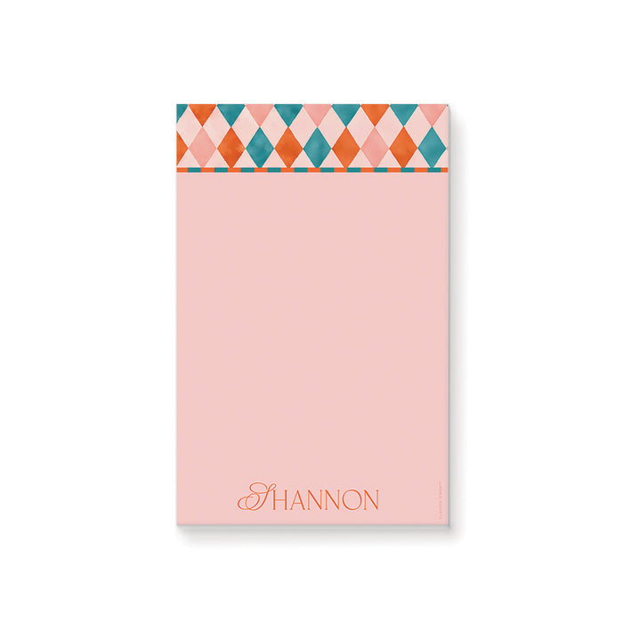 Personalized colorful geometric notepad with custom name, blush pink, teal, coral, orange pattern, and blank writing area